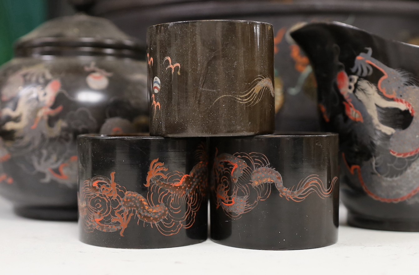 A Chinese Fuzhou lacquer ‘dragon’ wedding basket, 31cm high together with a similar teaset